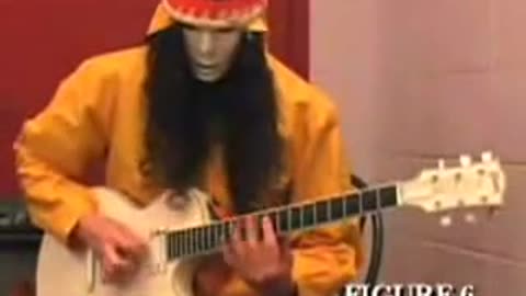 Buckethead gives a guitar lesson