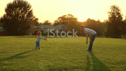 Joyful Moments: A Child's Playtime with Dad and Mum