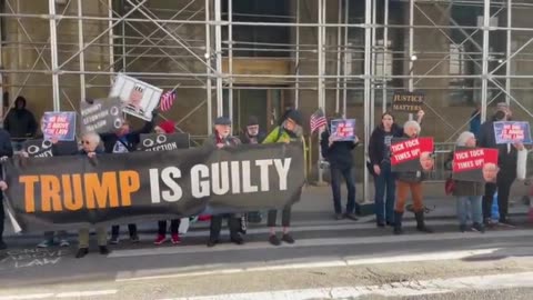 Anti-Trump demonstrators gather outside Manhattan courthouse to rally in favor of indictment