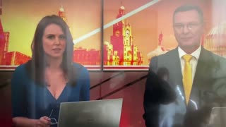 British News Anchor Sends Secret Message During Report on COVID