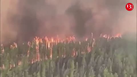 Aerials show wildfire burning in British Columbia