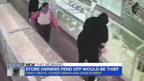 Dramatic moment Store owners fend off thief