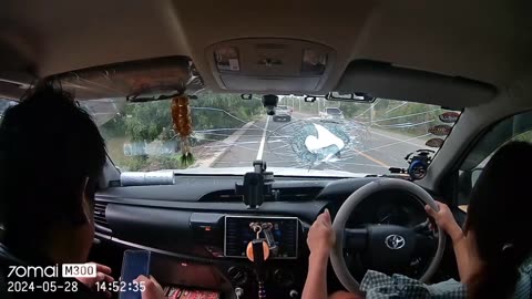 Passing Truck Sends Stray Rock Flying Into Windshield