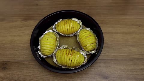 Baked potatoes with garlic and butter. Delicious and easy!