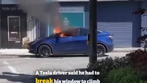Tesla locked driver in car as it burst into flames....