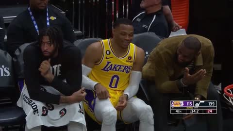 Russell Westbrook and Lebron James have a laugh on the bench after going 2-8 with Lakers