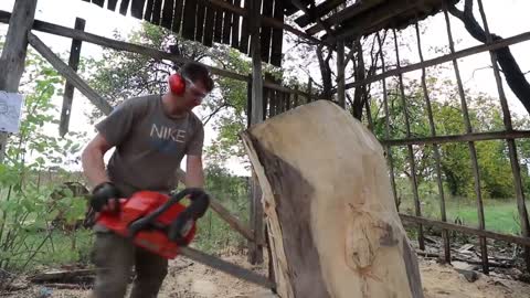 AMAZING CHAINSAW wood carving, Native American with wolves