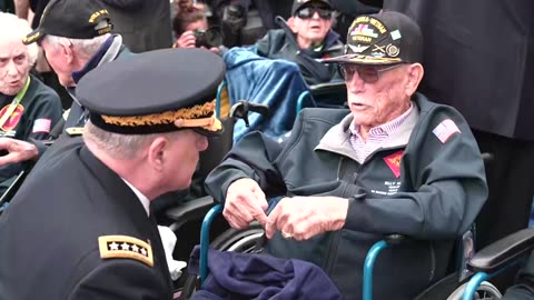 Joint Chiefs Chair Gen. Milley speaks with WWII veterans at Normandy D-Day ceremony