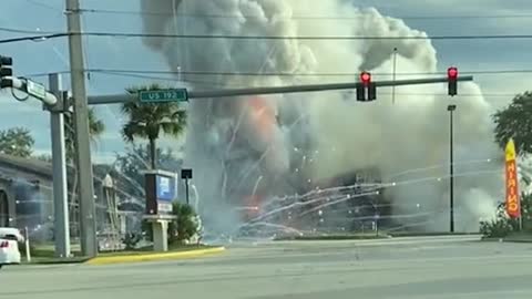 A fireworks store in Florida erupted into flames after an SUV crashed into it