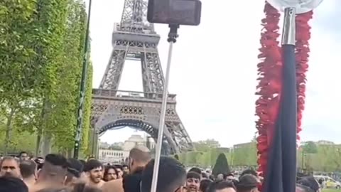 Muslim pedos and rapists dance in Paris near the Eifel tower while people watch