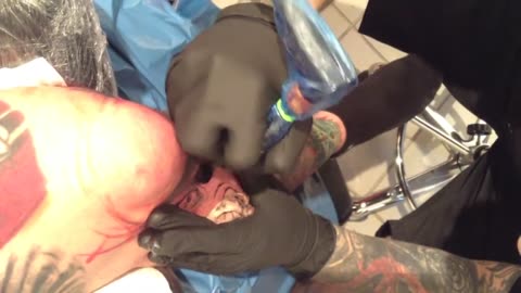 Getting tattooed by Tommy Lee Wendtner
