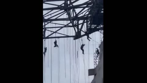 Half Dozen Construction Worker Dangling 50 Stories When Scaffold Collapses