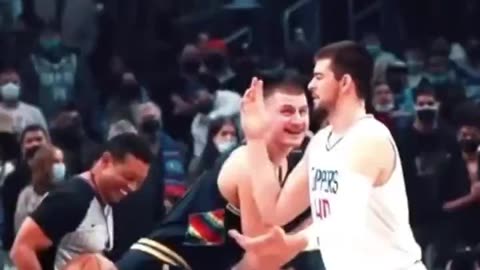 Jokic made the ref laugh during the tip off