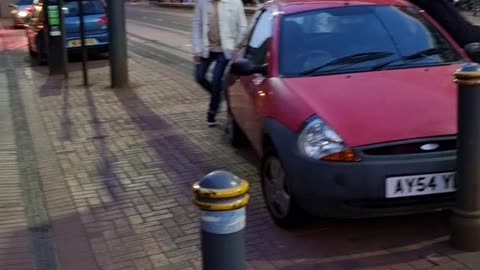 Parked Car Gets Pushed so Tram Can Pass