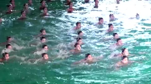 North Korea marks key anniversary with swimming showcase