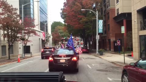 Downtown Atlanta driving by antiTrump citizens