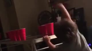 Toddler is already a champ at beer pong!