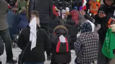 Ottawa protesters kneel in prayer