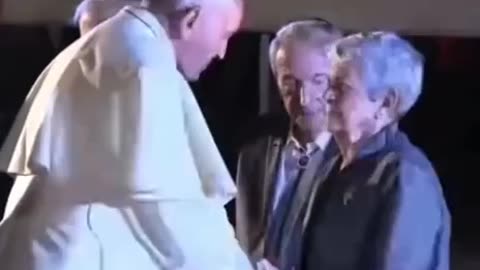 Pope kisses Rothchild’s hands.