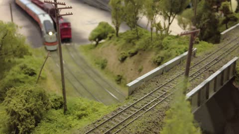 Model Trains Zooming Around The Sipping And Switching Train Layout