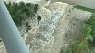 Wixom Lake Flows Over Collapsed Dam Wall