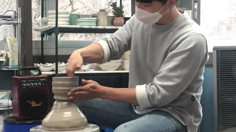 making a pottery with spinning wheel(ghost)