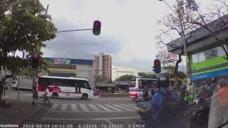 Talented Street Juggler Entertains During Red Light