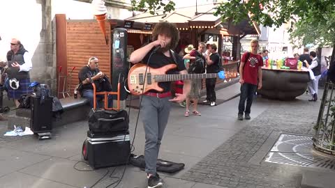 Busking Bass Player Works Miracles With A Loop Pedal