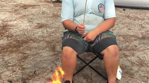 Georgia Boy roasting marshmallows