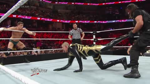 Cody Rhodes & Goldust vs empire Roman Reigns & Seth Rollins