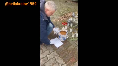 A latvian man brought a saucepan full of shit and placed it infront of the Russian Crocus center