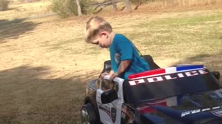 Little Boy Pretends To Take Sobriety Test To Drive Power Wheels Car