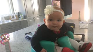 Infant Mesmerized by Her Dad Playing The Guitar