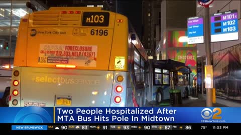 2 people hospitalized after MTA bus hits pole in Midtown