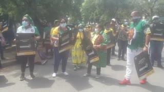 Members of the African National Congress (ANC) picket outside the eNCA studios in Hyde Par