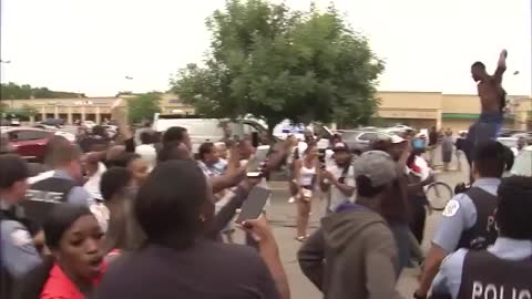 Tense protests after Chicago Police shoot and kill a man in South Shore