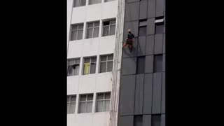 Man hangs out window of from Durban hotel