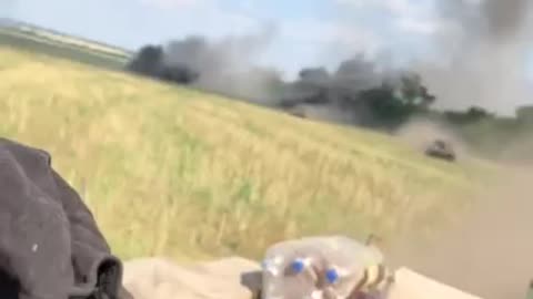 Ukrainian armour forces fleeing during heavy Russian artillery fire.