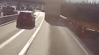 Distracted Truck Driver Nearly Topples Trailer