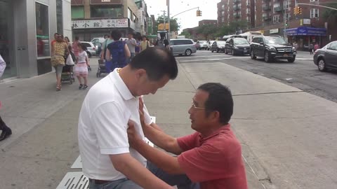 Luodong Massages Chinese Man On Bench
