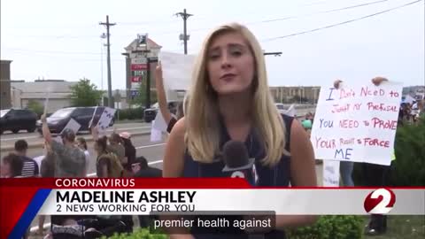 Several hundred people, protested against mandatory vaccinations of employees in Ohio hospitals.
