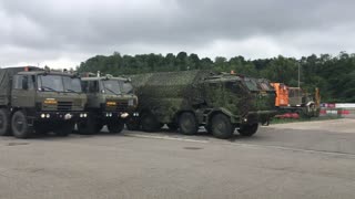 Czech Army Trucks Practice Driving Around Slippery Roads
