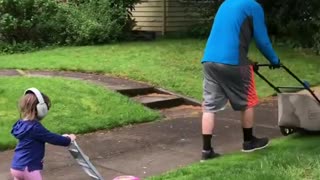 Father And Daughter Take Lawn Mowing Very Seriously