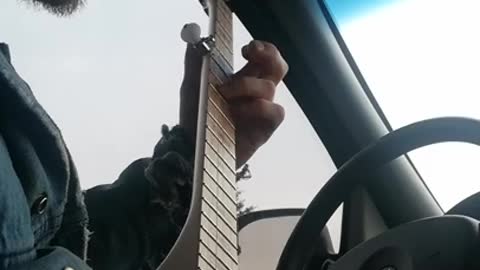Playing banjo in my van