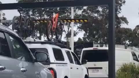 Rooftop Mounted Bike Rammed Into Low Clearance Sign