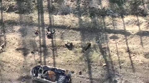 Ukrainian drone zooms in on armor and KIA Russian soldiers in Krynki, Kherson region.