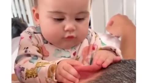 Baby eating ear