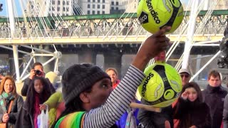 Amazing street performer balancing act in London