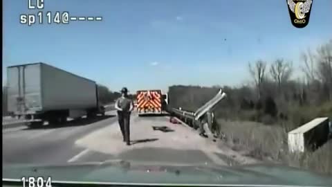 Dash Cam Captures Moment When Heroic Officer Saves Trucker's Life