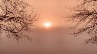 Beautiful Time lapse of the sunrise on a foggy, Sunday morning in Alabama